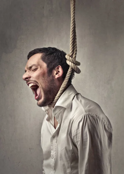A man suiciding with rope.