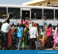 Impatience, People trying to get a seat in a bus.